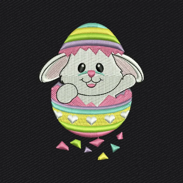 Diseño de bordado Conejo de Pascua dentro de un huevo decorado