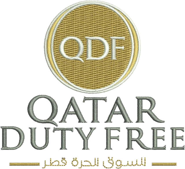 Qatar Duty Free Gold Roundel Logo Embroidery Design embroidery design shown stitched on fabric